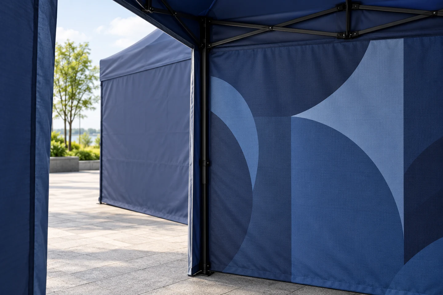 Illustrative navy gazebo entrance showing fabric wall surfaces inside and outside the stand.