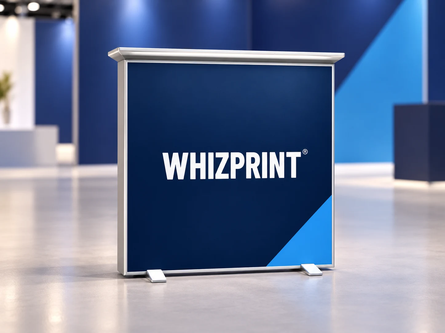 Slim Whizprint branded counter with a navy graphic, white logo and blue corner detail in an open indoor display space.